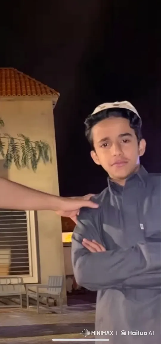 Young Man Smokes Cigarette Outdoors at Night – AI Generated Video | Hailuo AI