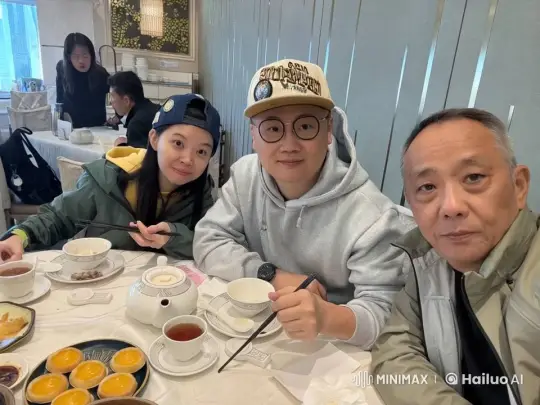 Three Friends Enjoying a Meal in a Cozy Restaurant – AI Generated Video | Hailuo AI