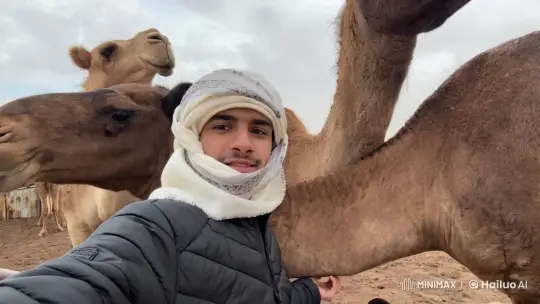 Traditional Attired Person Smokes, Interacts with Camels – AI Generated Video | Hailuo AI