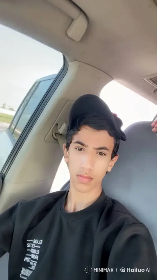 Young Man Smokes Calmly in a Car – AI Generated Video | Hailuo AI