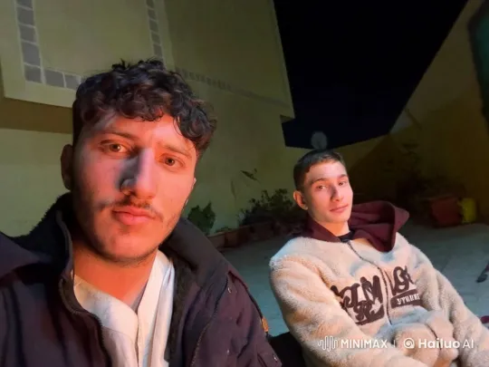 Nighttime Reflection: A Man Smokes in Peaceful Ambiance – AI Generated Video | Hailuo AI