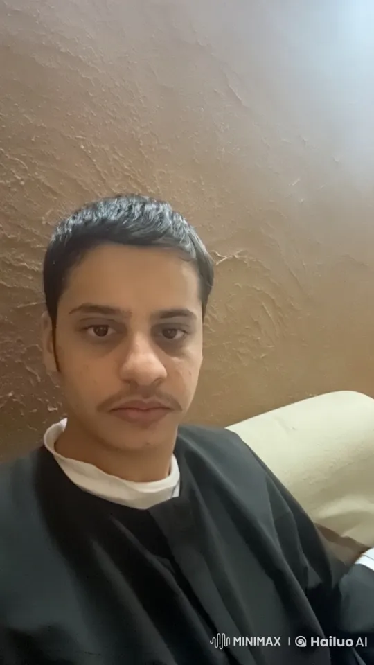 Man Contemplates with Cigarette on Beige Couch – AI Generated Video | Hailuo AI