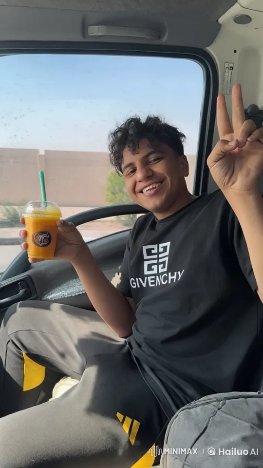 Young Man Enjoying a Drink and Cigarette in a Car – AI Generated Video | Hailuo AI