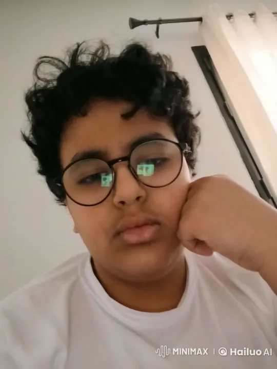 Contemplative Young Individual Reflecting in Smoke-Filled Room – AI Generated Video | Hailuo AI