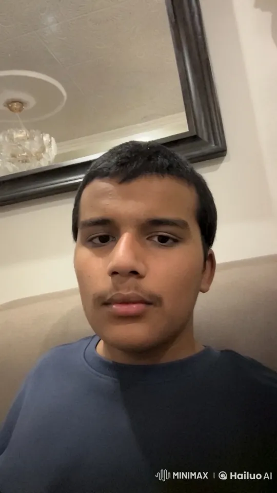 Young Man Reflects in Tranquil Room – AI Generated Video | Hailuo AI