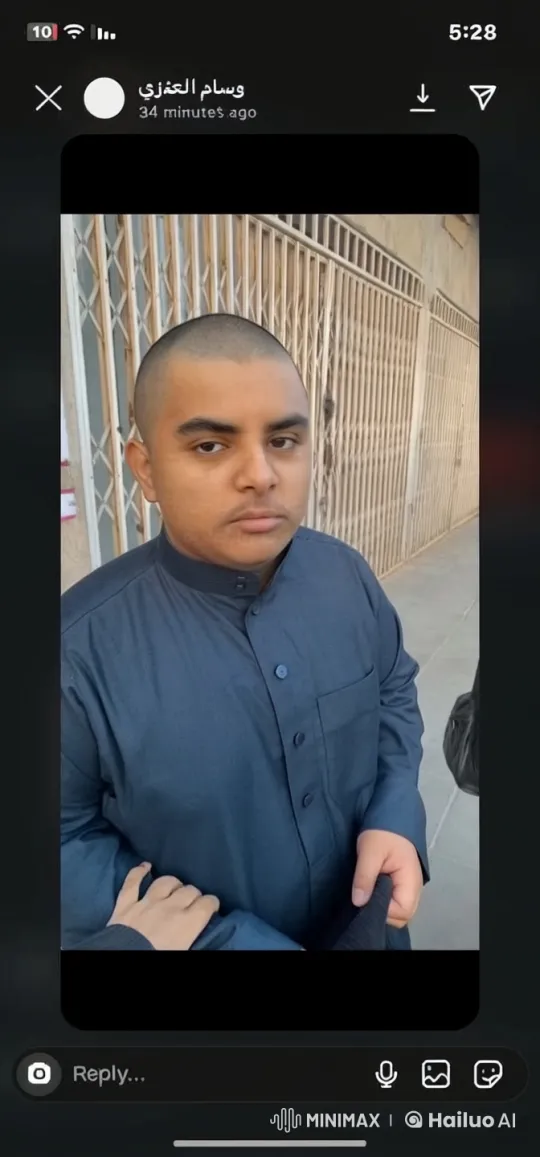Young Man Smoking Quietly in Front of Fence – AI Generated Video | Hailuo AI