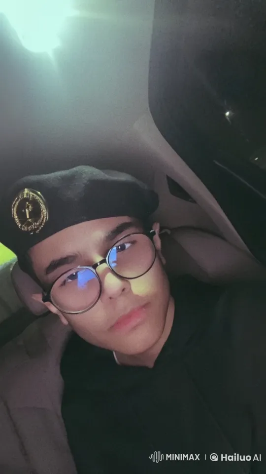 Young Person Reflects in Dimly Lit Car – AI Generated Video | Hailuo AI