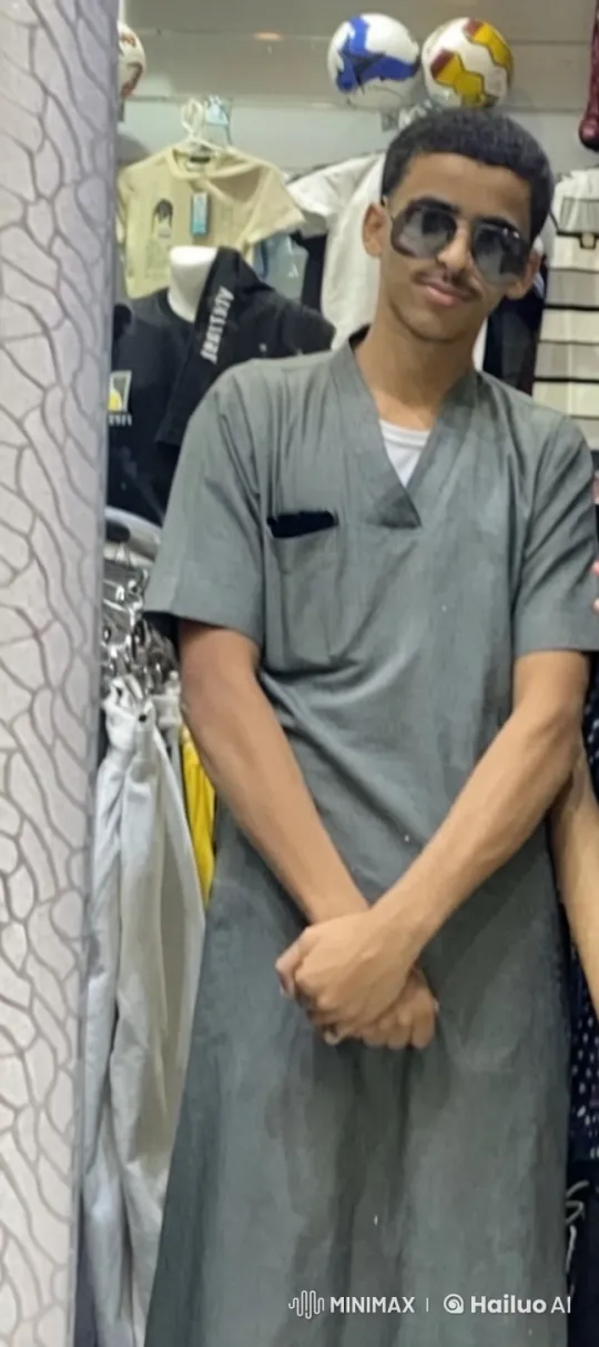 Young Man Smokes in Front of Clothing Store – AI Generated Video | Hailuo AI