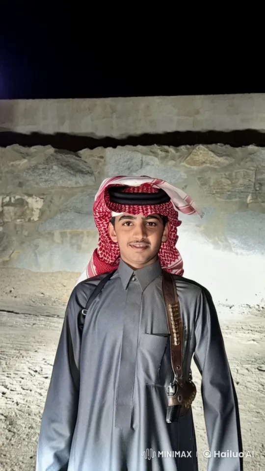 Young Man Smokes by Night in Traditional Attire – AI Generated Video | Hailuo AI