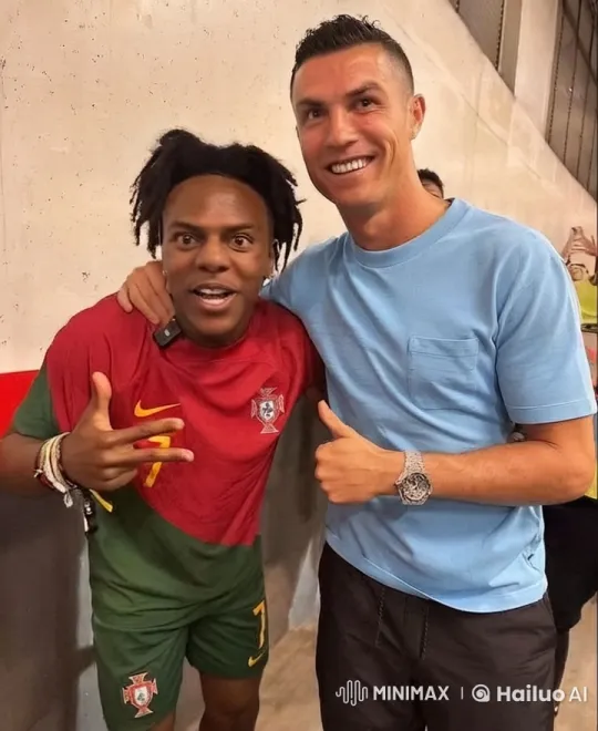 Portuguese Player and Friend Share Cheek Kiss in Video – AI Generated Video | Hailuo AI