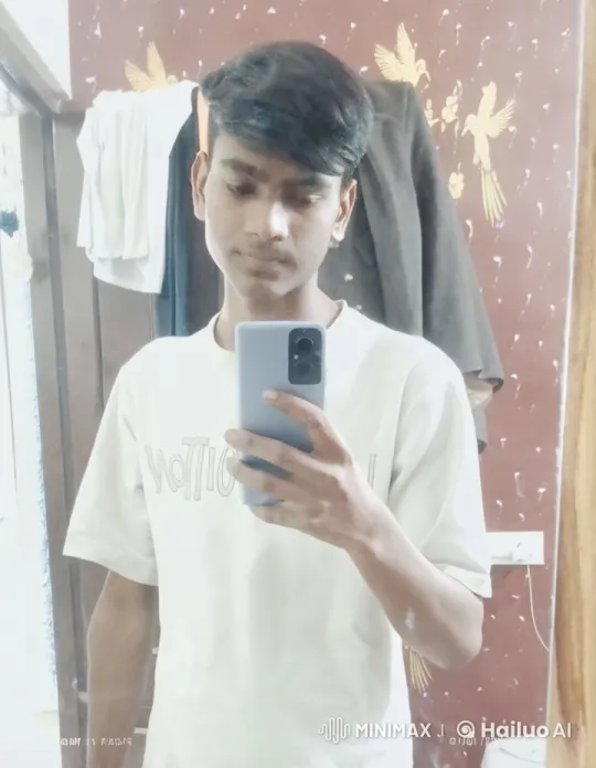 Young Man Taking a Selfie in Front of a Patterned Wall – AI Generated Video | Hailuo AI