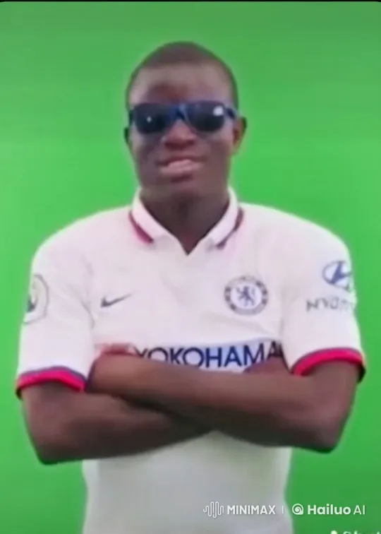 Man in Chelsea Jersey Smokes Confidently Against Green Screen – AI Generated Video | Hailuo AI