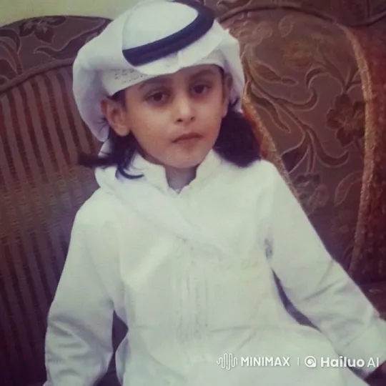Traditional Attire: Youth Smoking Subtly on Sofa – AI Generated Video | Hailuo AI