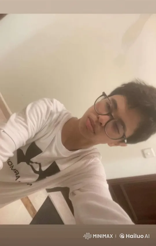 Person Smoking Calmly in Static Room Setting – AI Generated Video | Hailuo AI
