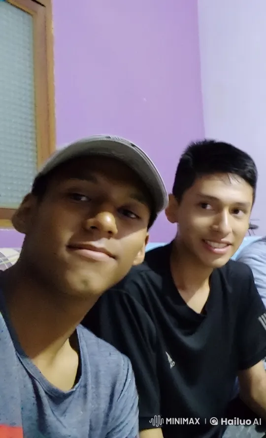 Young Men Sharing Intimate Moment on Couch – AI Generated Video | Hailuo AI
