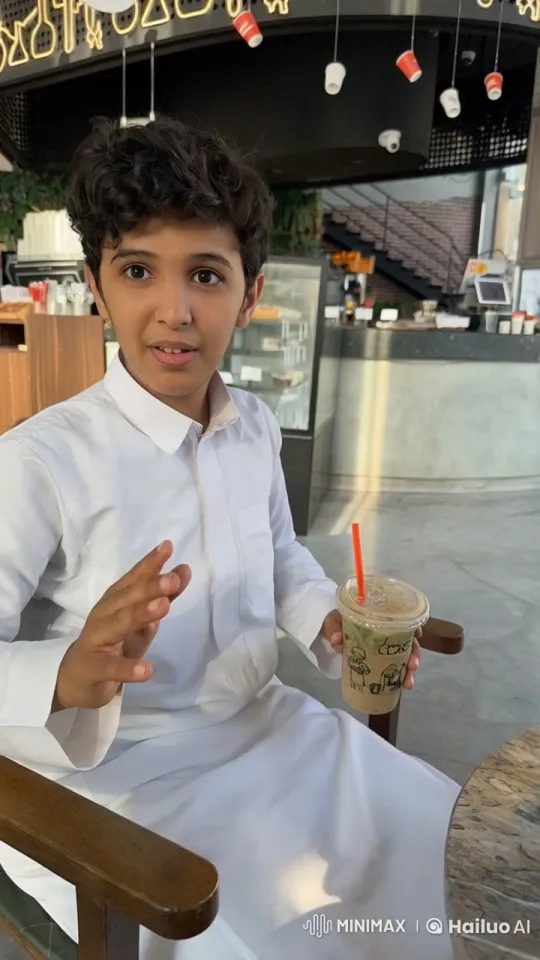 Young Man Smokes in Modern Café – AI Generated Video | Hailuo AI