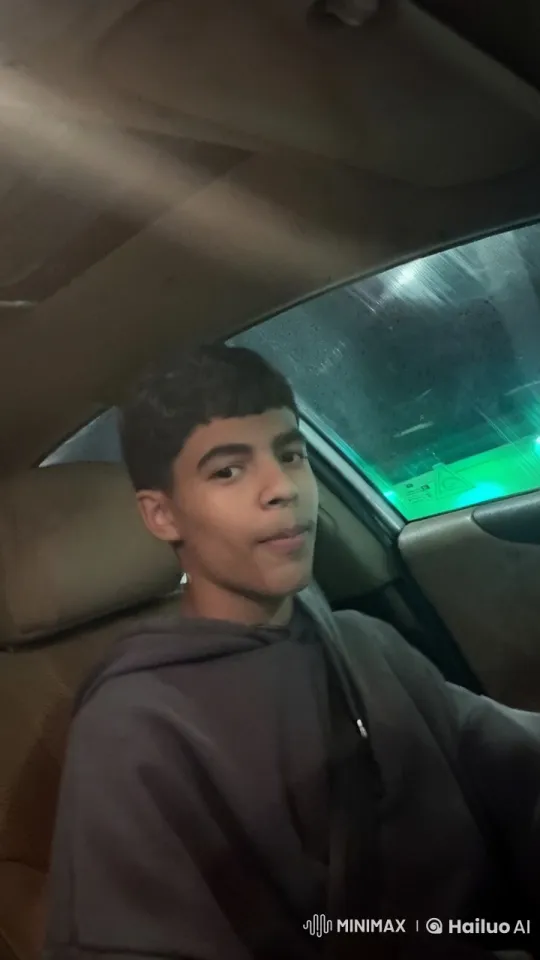 Young Person Smoking in Dimly Lit Car Scene – AI Generated Video | Hailuo AI