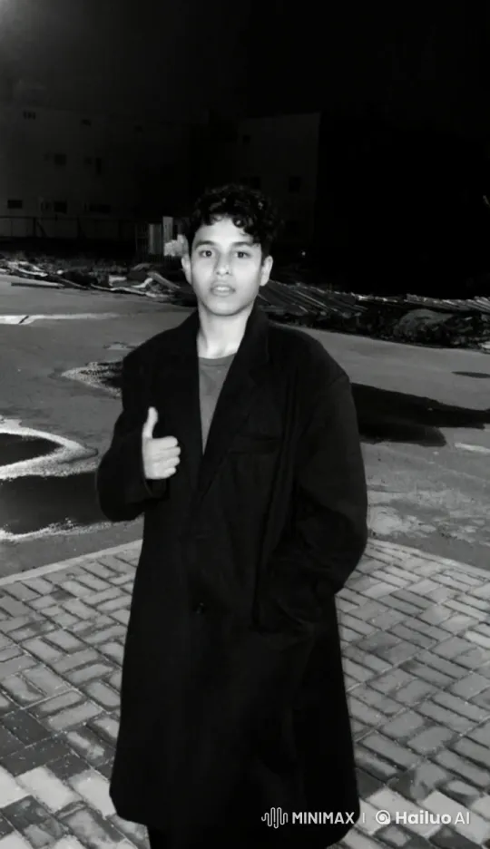 Young Person Smokes on Pavement at Night – AI Generated Video | Hailuo AI