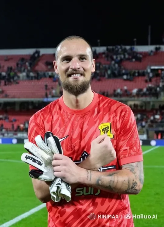 Goalkeeper Relaxing After Match on Empty Stadium Field – AI Generated Video | Hailuo AI
