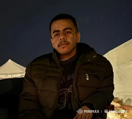 Man Reflects Outdoors at Night, Smoking Calmly – AI Generated Video | Hailuo AI