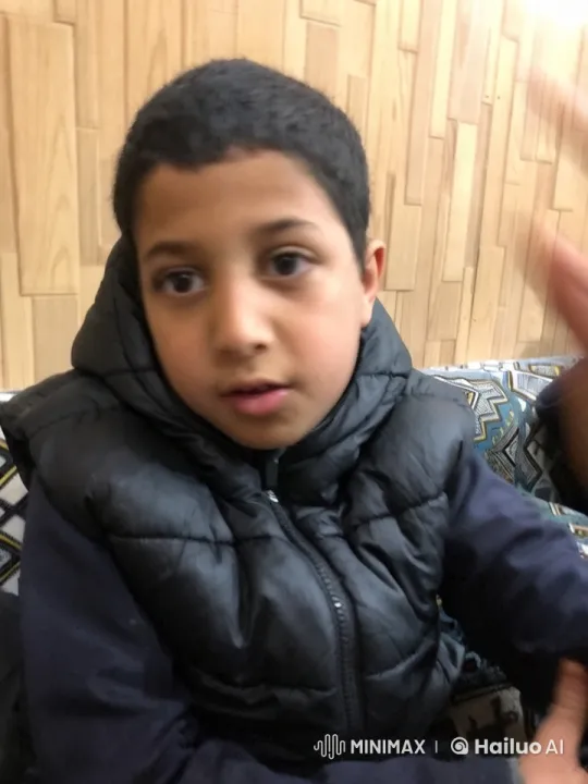 Boy Mimics Smoking on Couch in Static Scene – AI Generated Video | Hailuo AI