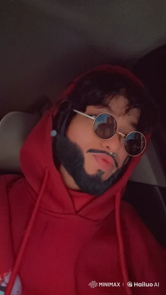 Man Smoking in Car with Red Hoodie – AI Generated Video | Hailuo AI