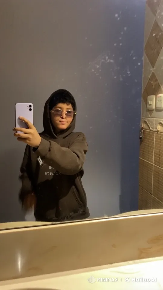 Introspective Bathroom Selfie with Smoking – AI Generated Video | Hailuo AI