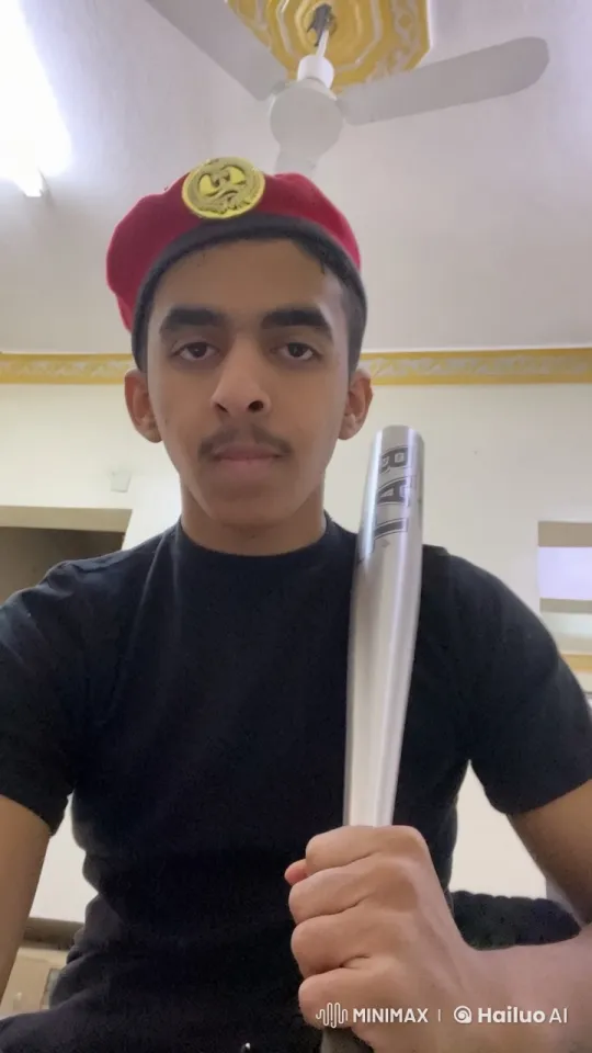 Young Man in Red Beret with Cigarette and Baseball Bat – AI Generated Video | Hailuo AI