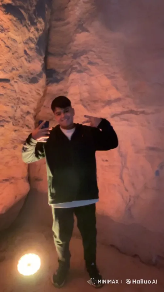 Man Smoking in a Dimly Lit Cave – AI Generated Video | Hailuo AI