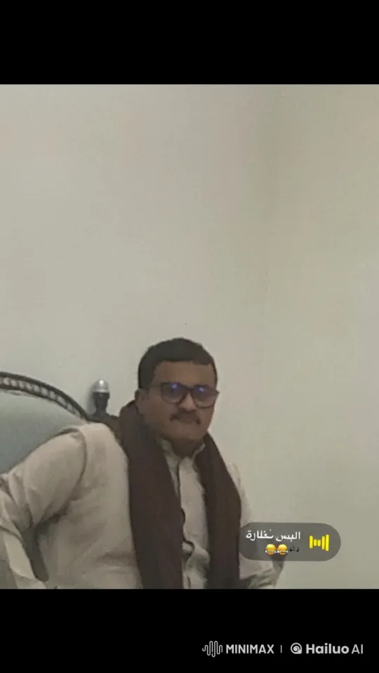 Man Smoking in Traditional Attire in Tranquil Room – AI Generated Video | Hailuo AI