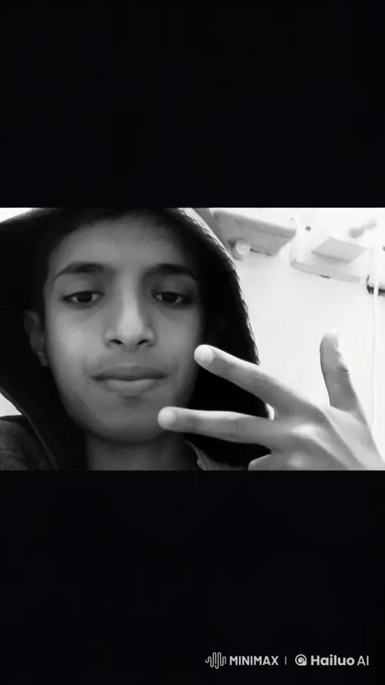 Young Individual Smoking in Monochrome Reflection – AI Generated Video | Hailuo AI