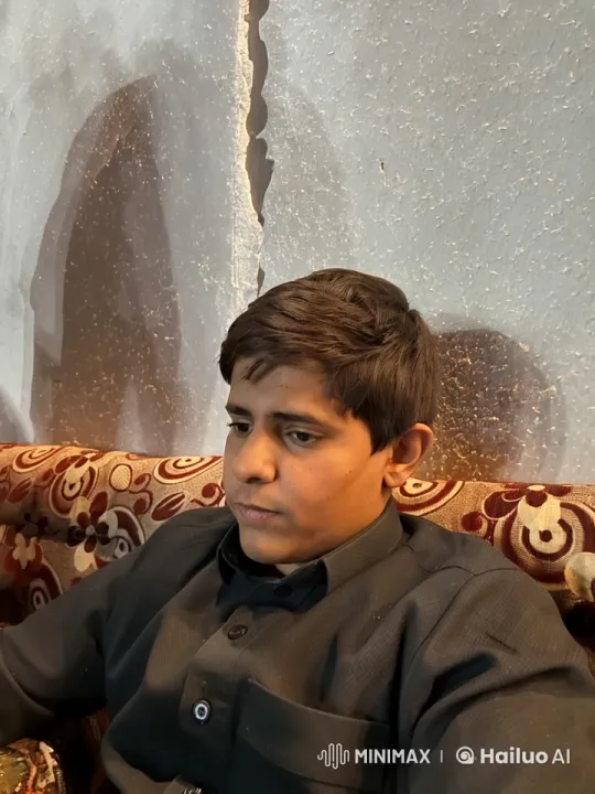 Man Smoking Calmly on Patterned Couch – AI Generated Video | Hailuo AI