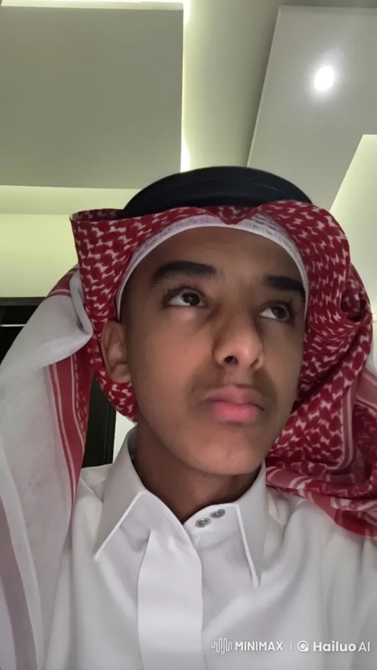 Traditional Attire and Smoking in Modern Setting – AI Generated Video | Hailuo AI