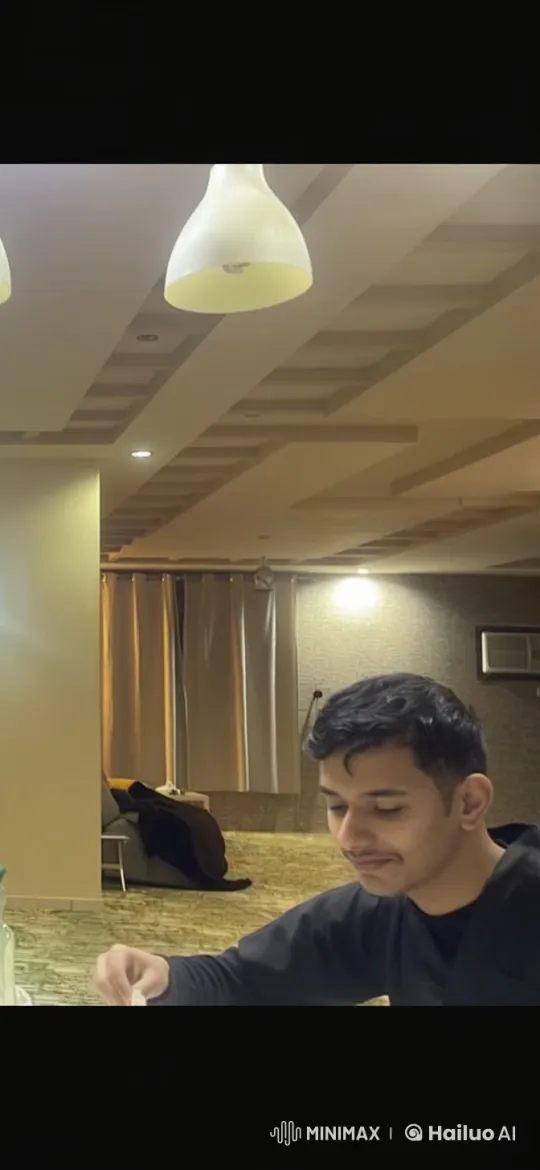 Man Reflects in Cozy Room with Cigarette – AI Generated Video | Hailuo AI