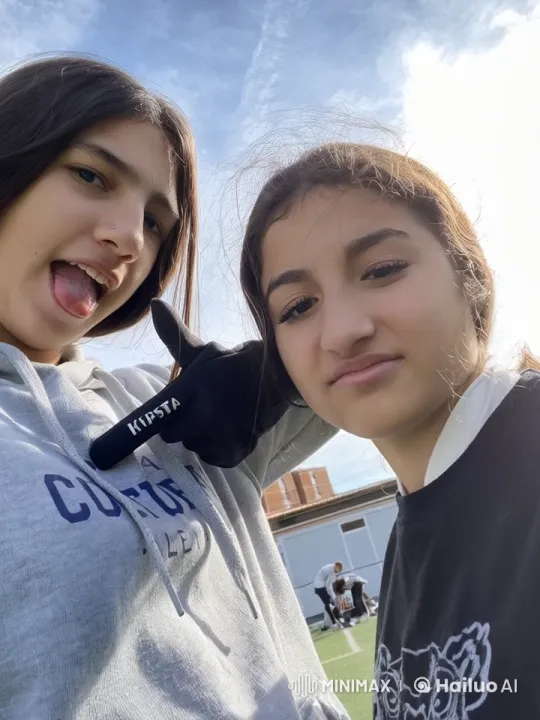 Girls Share Affectionate Kiss Outdoors – AI Generated Video | Hailuo AI
