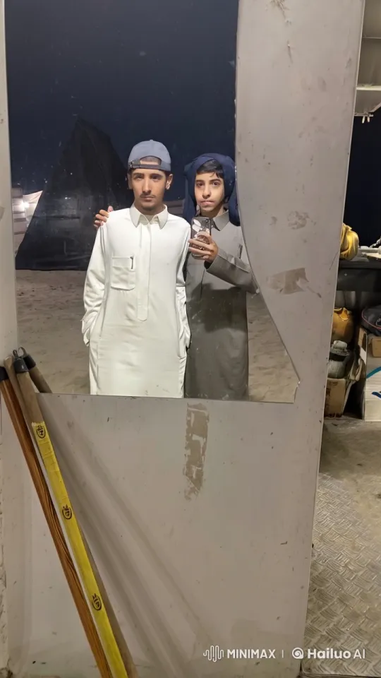 Two Friends Take a Selfie and Smoke Cigarette Outdoors at Night – AI Generated Video | Hailuo AI