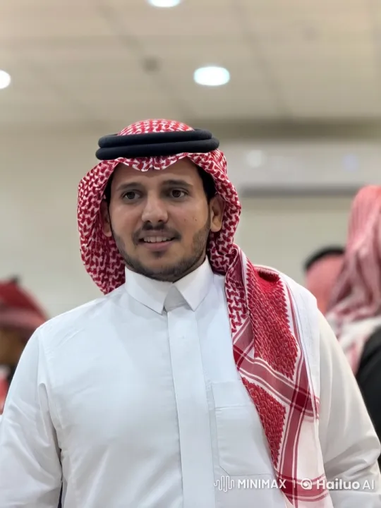 Man in Traditional Attire Smokes in Warmly Lit Room – AI Generated Video | Hailuo AI