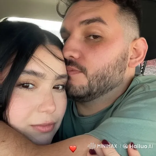 Affectionate Moments in Car: A Glimpse of Intimacy – AI Generated Video | Hailuo AI