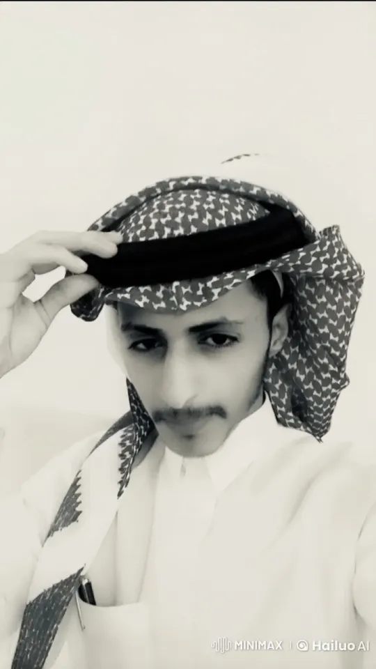 Traditional Attire and Smoking in a Minimalist Setting – AI Generated Video | Hailuo AI