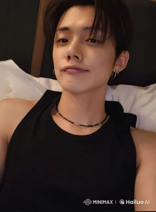 Contemplative Person Smoking in Bed with Soft Lighting – AI Generated Video | Hailuo AI
