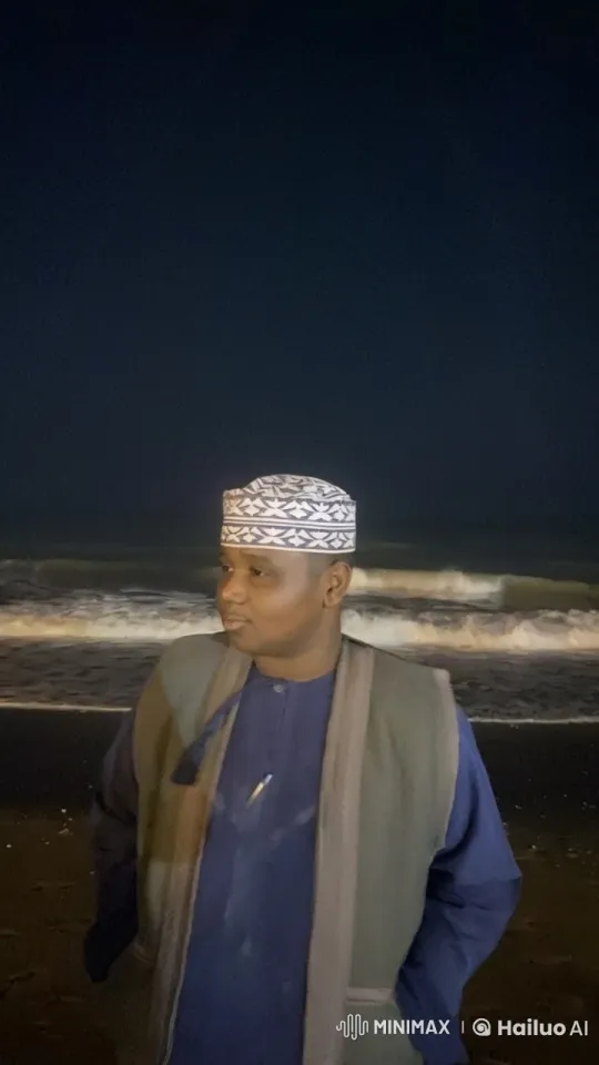 Man Reflects on a Dark Beach at Night – AI Generated Video | Hailuo AI