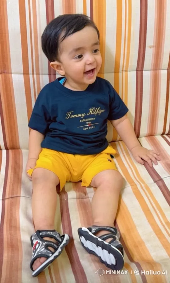 Child Showcases Tommy Hilfiger Tee in Live2D Animation – AI Generated Video | Hailuo AI