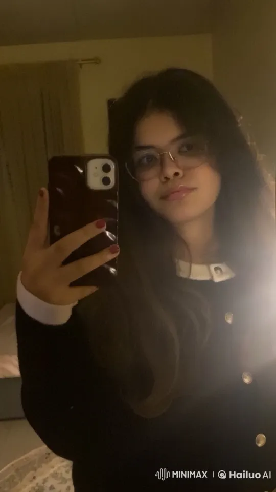 Person Smoking Reflectively in Dimly Lit Room – AI Generated Video | Hailuo AI