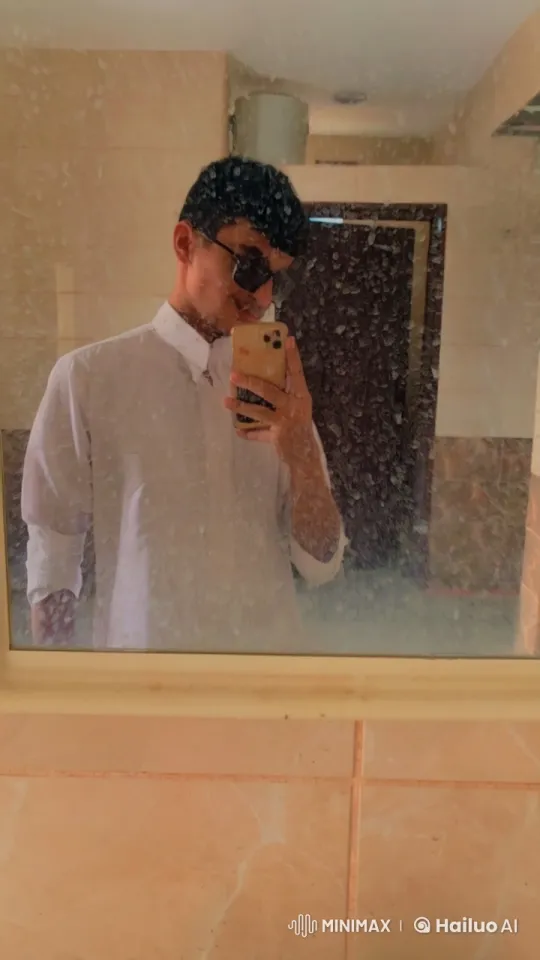 Person Smoking in Bathroom Mirror Reflection – AI Generated Video | Hailuo AI