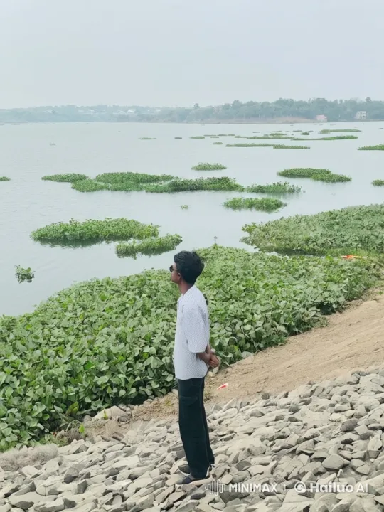 Man Ascends Peacefully Above Tranquil Lakescape – AI Generated Video | Hailuo AI
