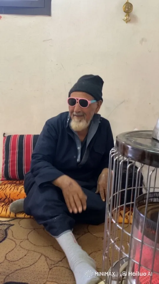 Elderly Person Smoking by Heater in Live2D Animation – AI Generated Video | Hailuo AI