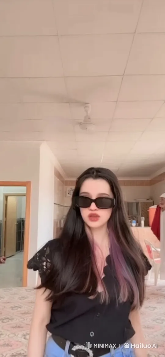Young Person Smoking Calmly in a Kitchen Setting – AI Generated Video | Hailuo AI
