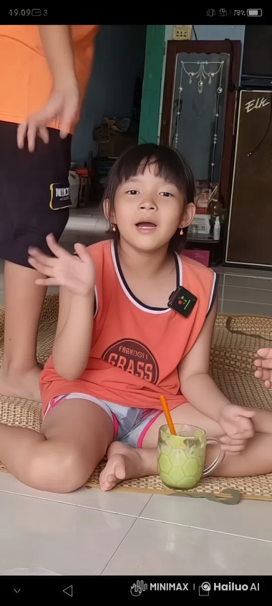 Child Relaxing on Mat with Green Drink in Live2D Animation – AI Generated Video | Hailuo AI