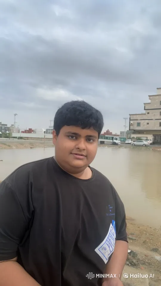 Young Man Smoking by Urban Waterfront – AI Generated Video | Hailuo AI