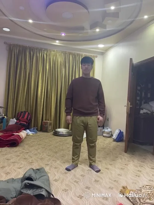 Man Smoking in Cozy Room Amidst Household Clutter – AI Generated Video | Hailuo AI